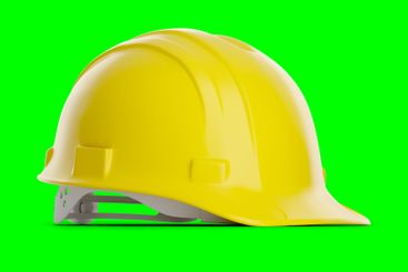 Yellow Construction Hard Hat Isolated on a Green Screen.