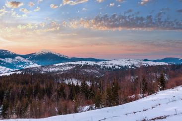 Evening winter cloudy day mountain ridge