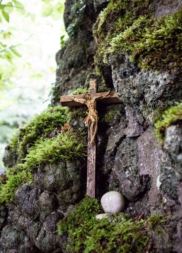 Religious and Christian objects and candles on the...