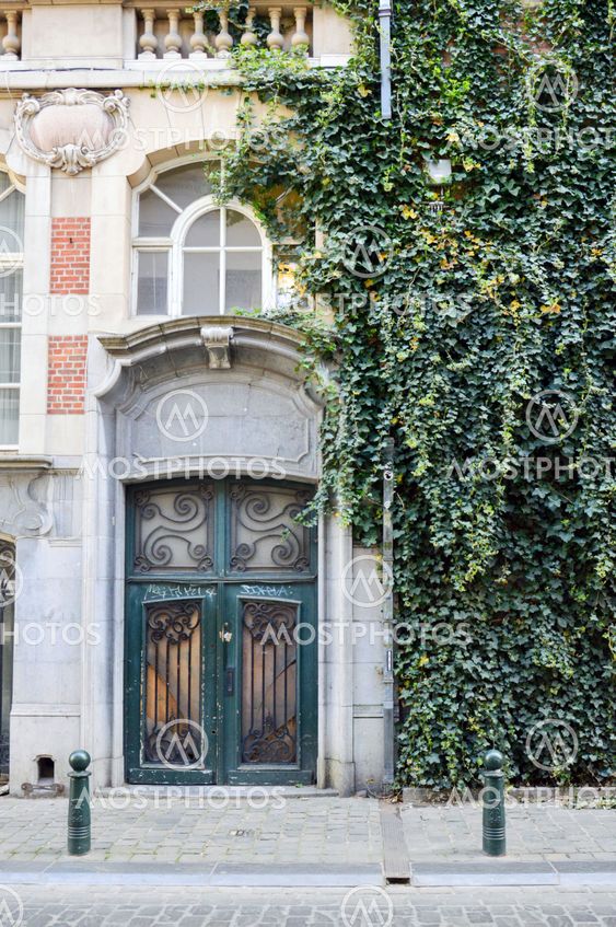 Brussels, Belgium - April 2015: Preserved old European-style residential and commercial buildings on streets of Brussels City, Belgium
