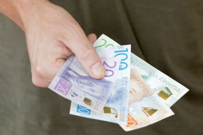 Hand holding swedish bank notes, SEK