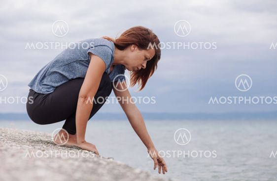 Woman alone and depressed on the bridge