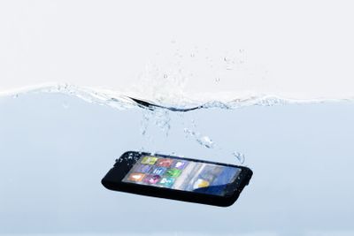Mobile Phone Submerged In Water
