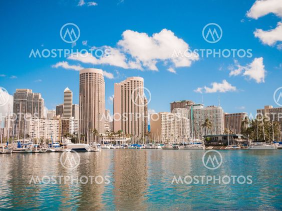 HONOLULU, HAWAII - FEB 2: View of Waikiki Yacht club from Ala Moana beach park with buildings behind