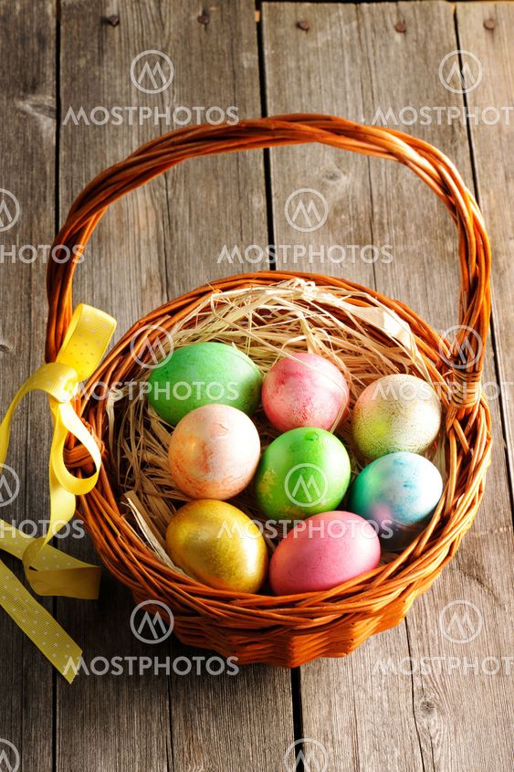 Colored easter eggs in basket
