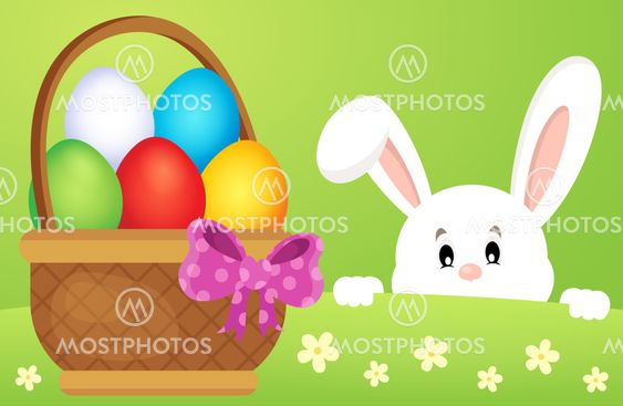 Lurking Easter bunny by basket with eggs
