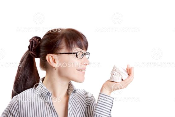 Smile with bracket and white plaster jaw model