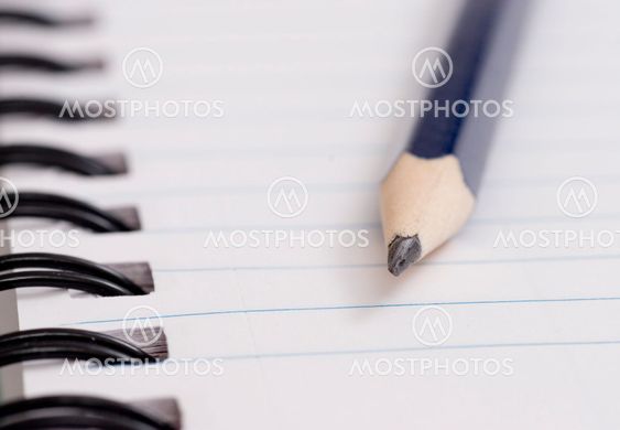 pencil on notebook