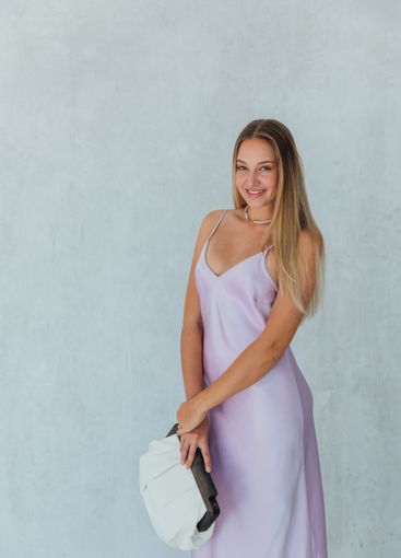 Portrait of a beautiful fashionable woman in a summer...