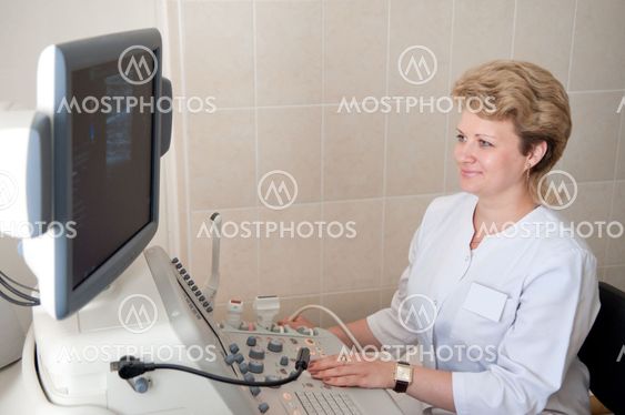 medical doctor during ultrasound investigation