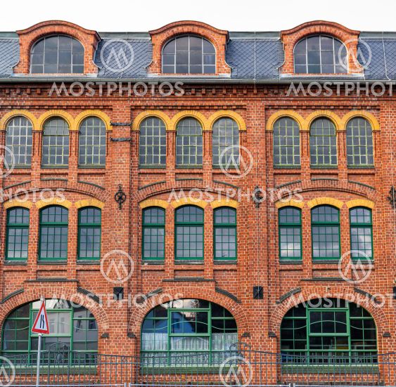 red brick facade of old industrial building