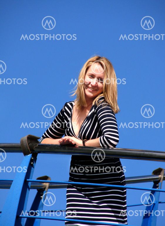 Yong woman on a yacht