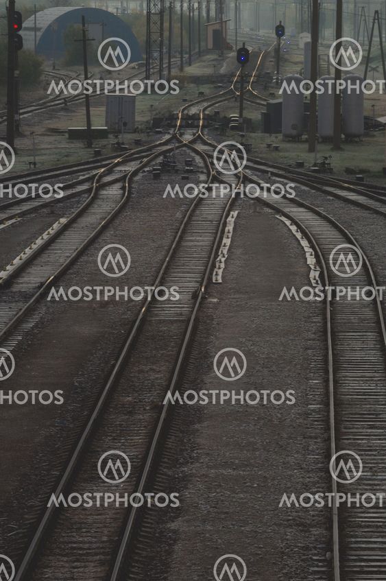 Railroad tracks at train station, transportation infrastructure