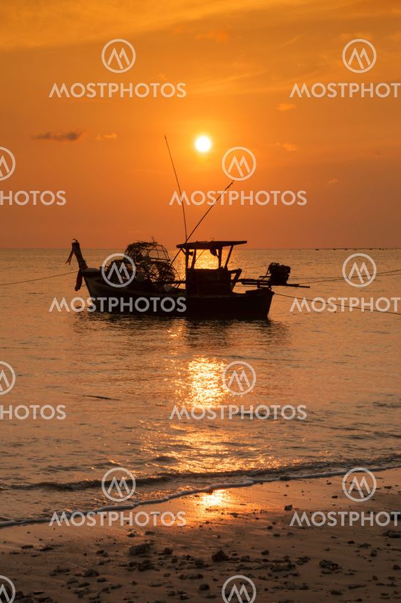 Fishing boat and sunset