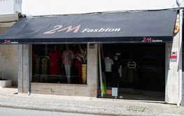Front view of a fashion store in Fatima, Portugal under...