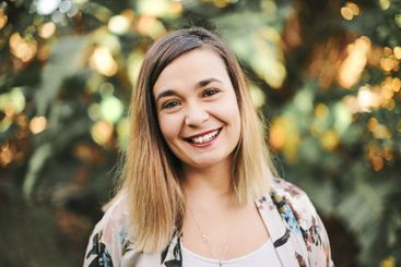 Face portrait, smile and woman outdoor with beauty,...