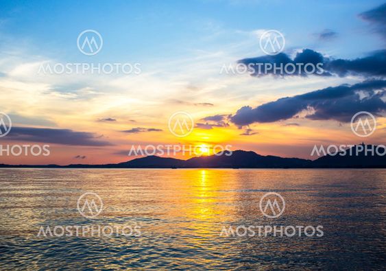Sunset with mountain on seascape