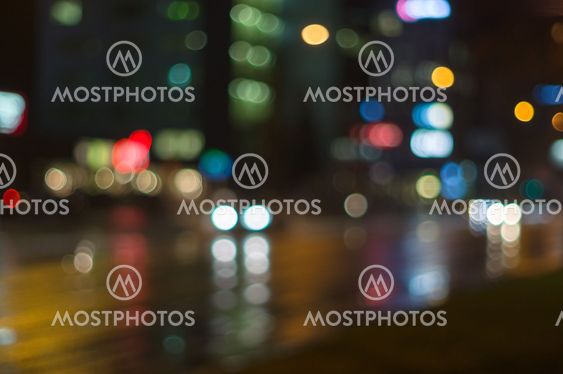 City street traffic motion with blurred bokeh lights