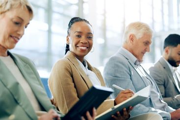 Woman, notebook and portrait in waiting room for...