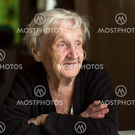 An elderly woman, closeup portrait.