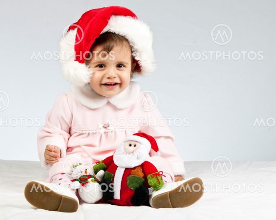 Little pretty girl with santa's hat