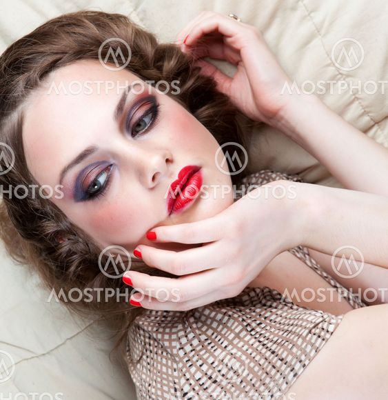 Portrait of young woman with big eyes