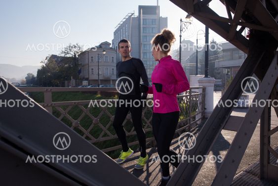 woman stretching before morning jogging