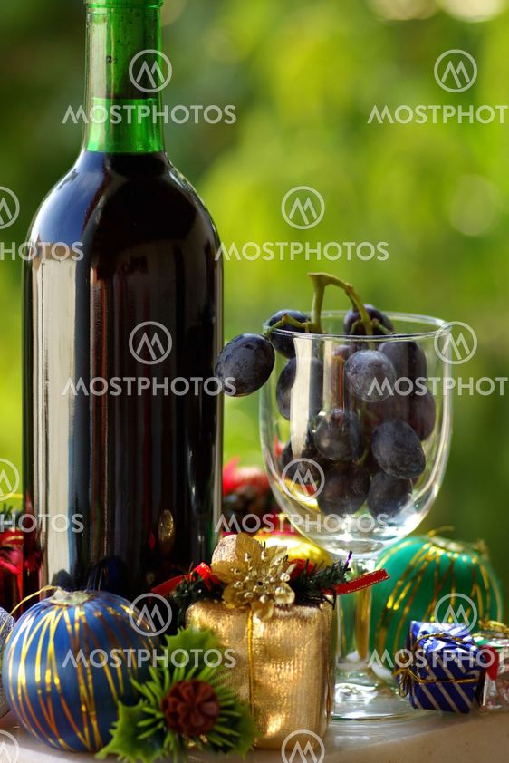 red wine with Christmas presents
