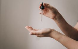 facial oil on a white background. Pipette