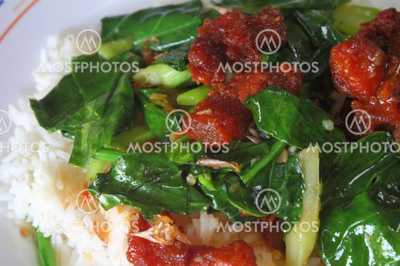 stir fried kale with crispy pork