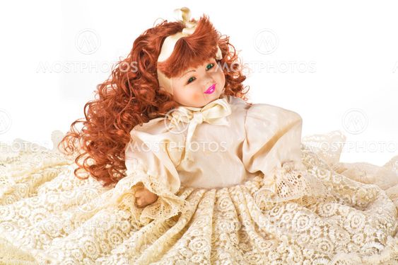 porcelain doll on white background