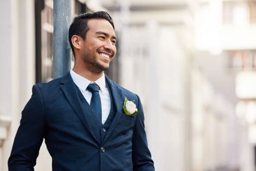 Happy, city and man with smile for wedding, romantic...