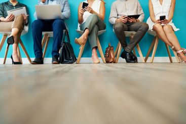 Business people, legs and waiting room with technology...