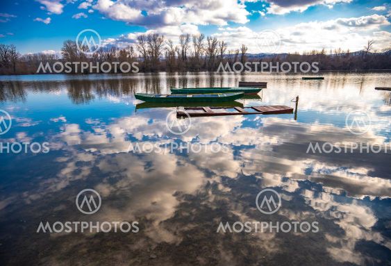 Small boats on the calm lake