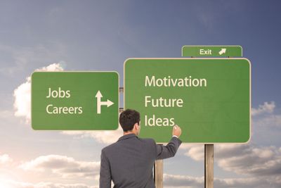 Composite image of businessman standing back to camera...