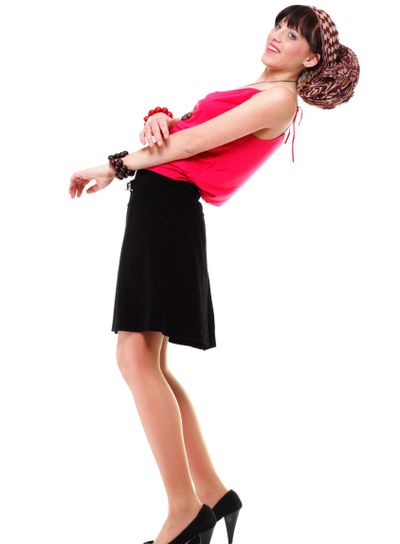 Full length woman in a turban isolated