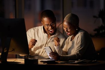 Business, success and black people in celebration with...