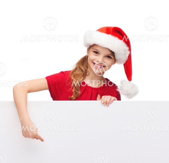 child in santa helper hat with blank white board