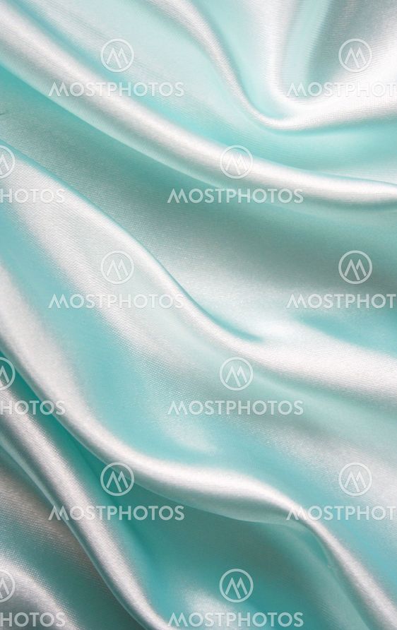 Smooth elegant blue silk as background