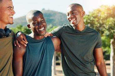 Fitness, men and happy friends outdoor with hug for...