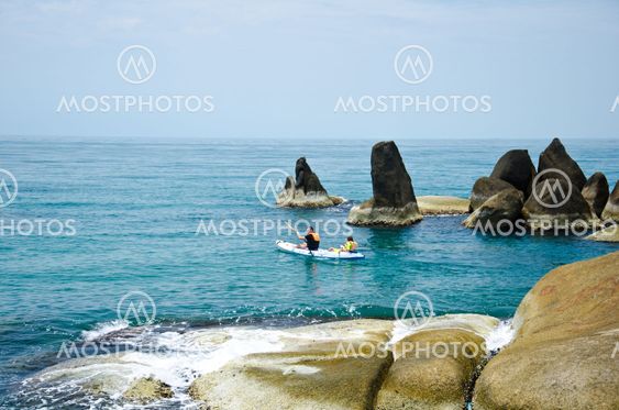 Traveler kayaking in the Gulf of Thailand.