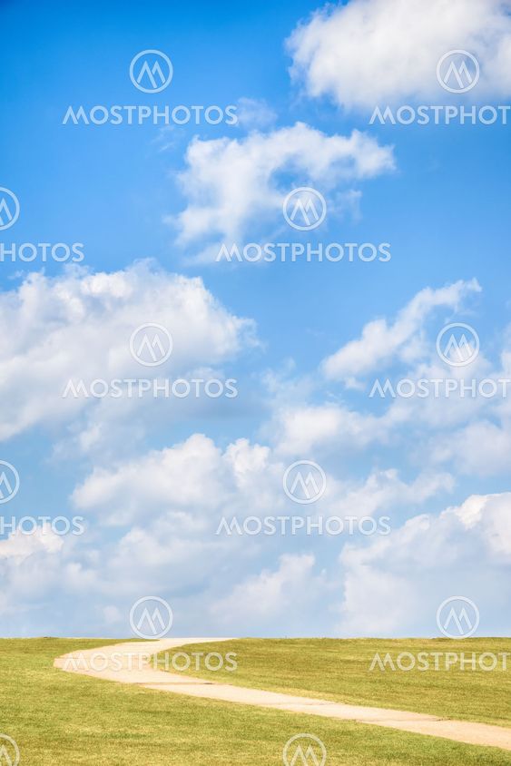 green hill with blue sky