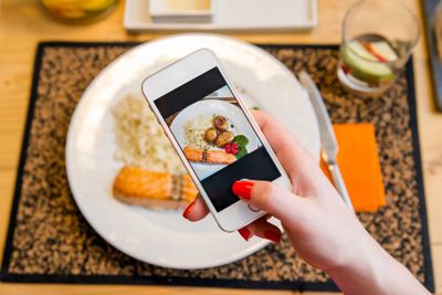 Taking a picture of the food