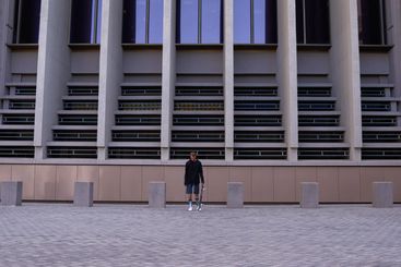 Skateboard, sports and man in city for outdoor activity,...