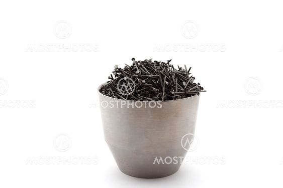 iron nail in metallic cup