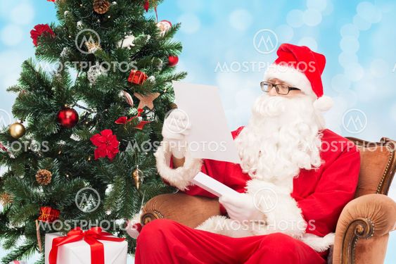 man in costume of santa claus with letter