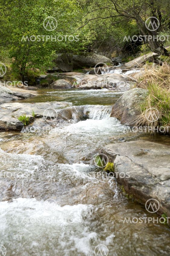 river with small waterfalls