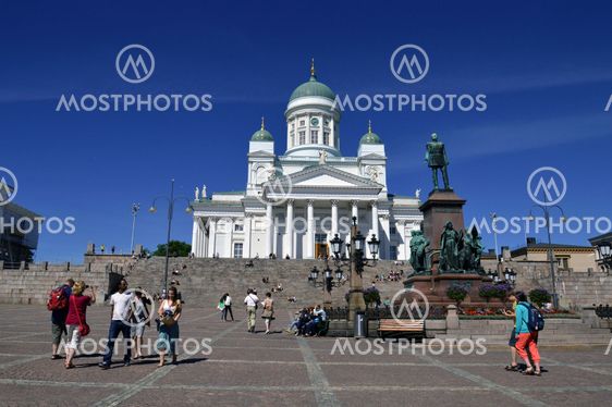 Lots of people visiting Helsinki Cathedral or Helsingin tuomiokirkko, Suurkirkko, in the centre of Helsinki, Finland.
