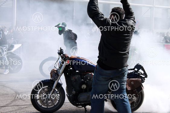 stunt rider making drift