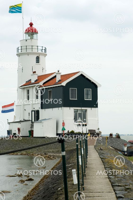 lighthouse with 2 flags